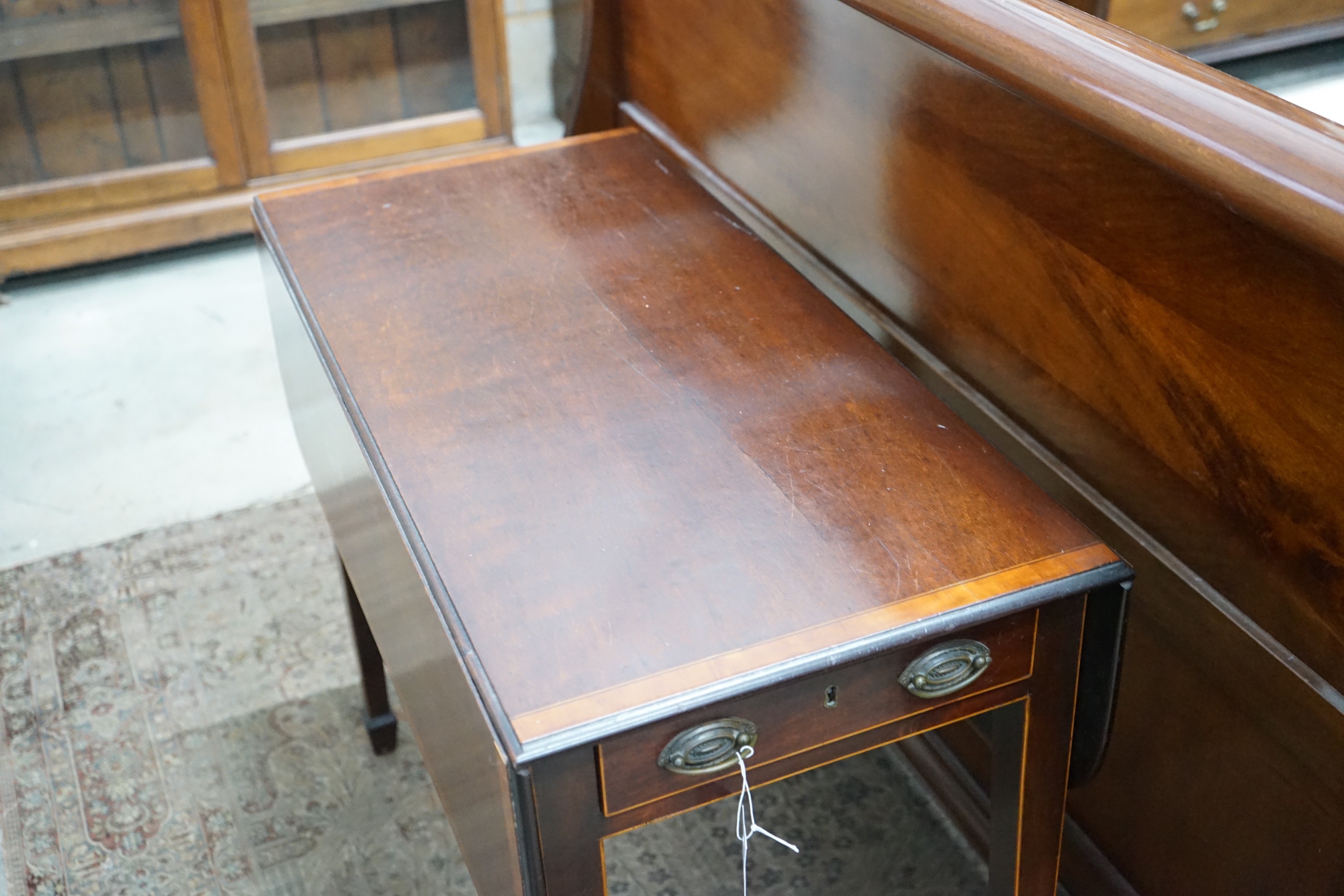 A George III satinwood banded mahogany Pembroke table width 85cms, depth 40cms, height 69cms